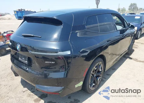 2024 BMW Ix xDrive50 z USA, uszkodzony, nr VIN WB523CF02RCN52082